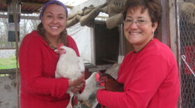 Girasol Romero (left) and Kathia Duran with part of the Latino Farmers Cooperative flock.