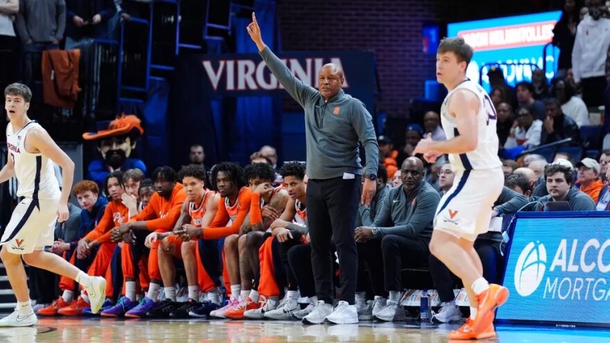 Head Coach Adrian Autry (Pointing) giving directions against Virginia on Saturday.
