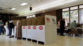 Voters mark their ballots in the Crown Heights Christian Church on June 16, 2026 in Oklahoma City.