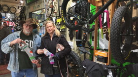 Renard and Mary Ellen Turner from Cleveland found bicycle socks -- with humorously ribald messages on them -- during their first visit to the Northside Marketplace, on Small Business Saturday.