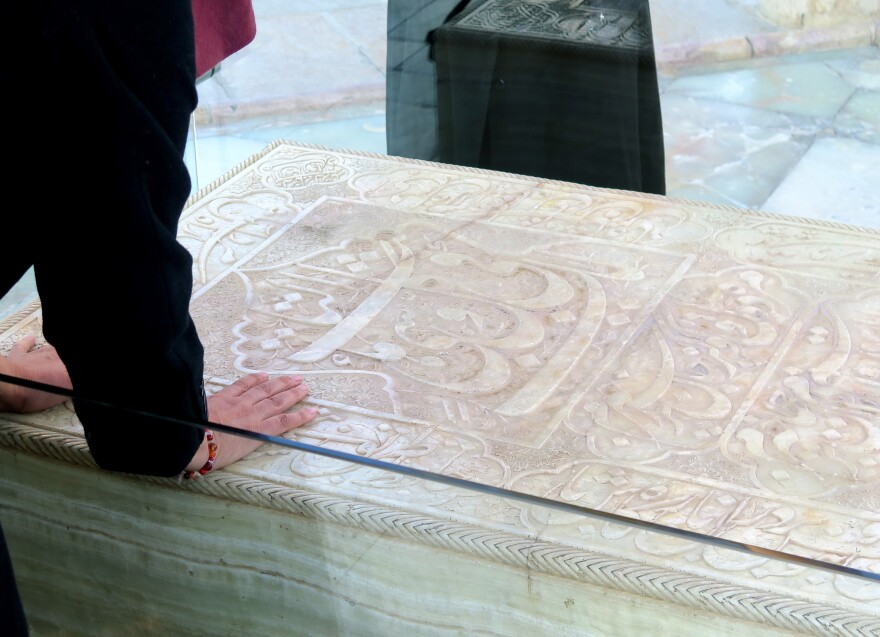 Firoozeh Mohammad-Zamani presses her hands on the stone tomb of Hafez. "Every time that I am coming here," she says, "something special happens to me."