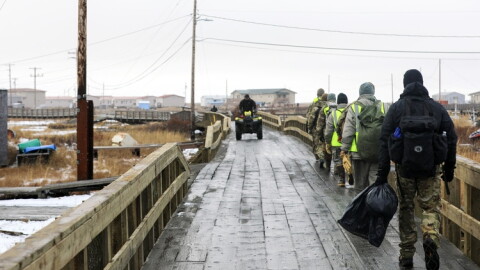 Alaska Organized Militia members, assigned to Task Force Bethel, arrive at Tuntutuliak, Alaska, for post-storm clean-up efforts during Operation Halong Response, Oct. 25, 2025.