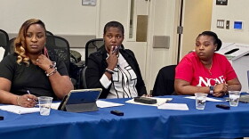  Amanda Thompson Rice, (left), president of the Charlotte-Mecklenburg Association of Educators; Nicole Price, (center), a North Carolina Association of Educators staff executive; and NCAE President Tamika Walker Kelly 