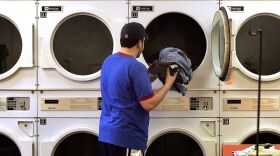 A man at a Maytag laundromat in Mount Prospect, Illinois. (Tim Boyle/Getty Images)