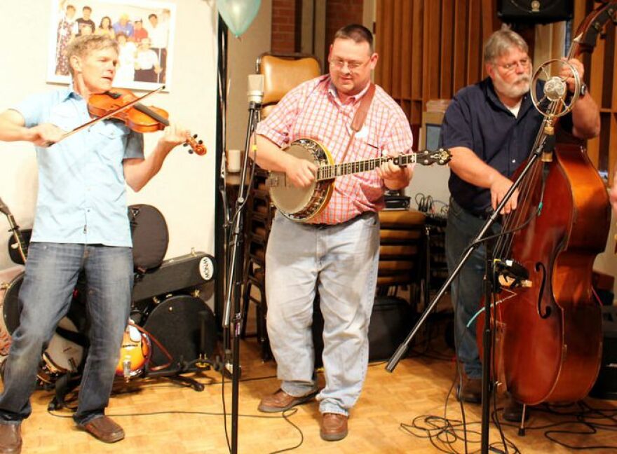 Crooked Pine, L-R is Marion Boatwright on fiddle, Troy Harrison on banjo, Craig Bannerman on upright bass. 