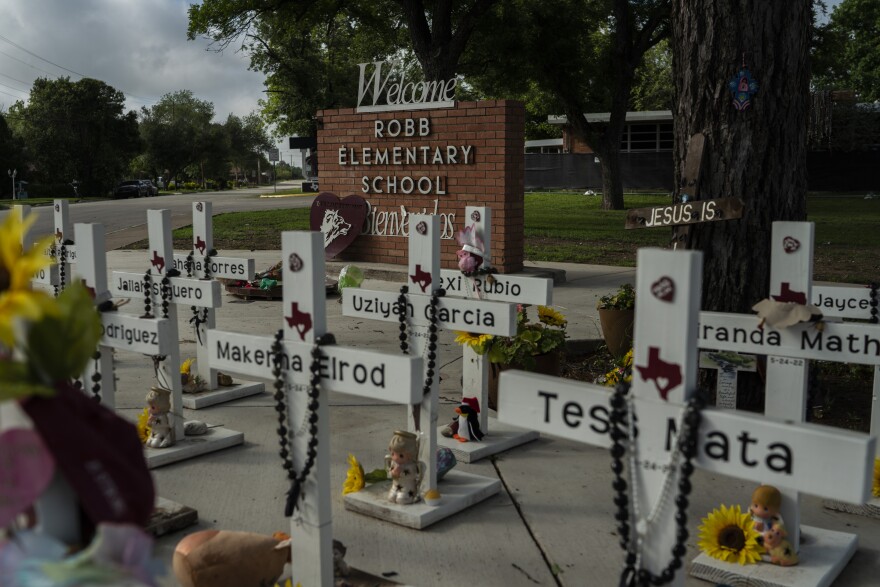 UVALDE, TEXAS: The memorial at Robb Elementary School in Uvalde, Texas for the mass shooting that happened on May 24, 2022, killed 19 children and two teachers. For surviving families, the year since has been an agonizing fight for answers and accountability. <a href="https://www.npr.org/2023/05/24/1177729989/a-year-after-uvaldes-school-massacre-healing-remains-elusive">See the story.</a>