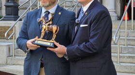 New York State Troopers Police Benevolent Association President Charles Murphy presents Assemblymember Patrick Burke with an award recognizing his work to advance the state’s new critical incident leave policy for troopers.