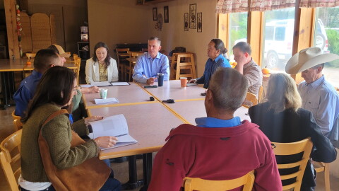 Senator Martin Heinrich sits with members of New Mexico's Agricultural community at Wagner Farm in Corrales on Tuesday.