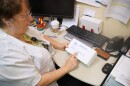 Kathy Howard, who has worked as a sexual assault nurse examiner for decades, shows an unused rape kit. Sept.  27, 2019