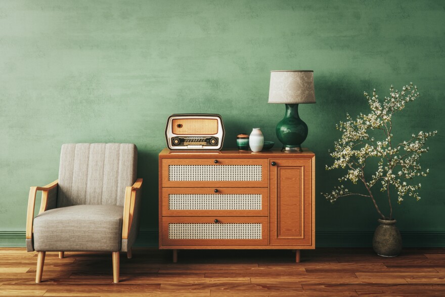 Retro living room with stylish furniture and vintage accessories.