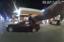 In this image taken from Oct. 2, 2022 police body camera video and released by San Antonio Police Department, Erik Cantu drives away as San Antonio Police officer James Brennand shoots his pistol at the car in a fast food restaurant parking lot in San Antonio, Texas. Brennand opened fire several times wounding the unarmed teenager as he drove away.