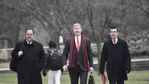 OSU President Ted Carter (center) walks around campus on his first day.