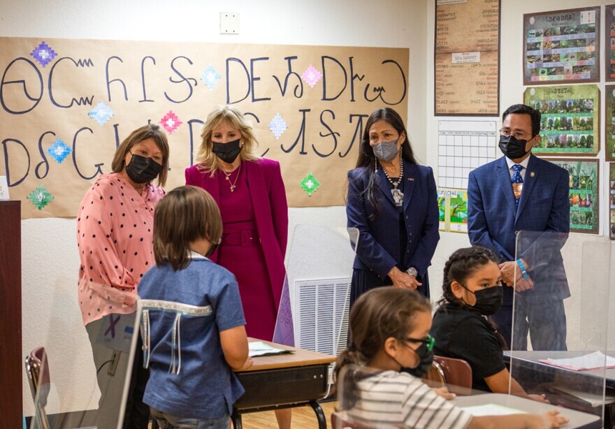 left to right: Third-grade Cherokee Immersion School teacher Cindy Collins, First Lady Dr. Jill Biden, Secretary of the Interior Deb Haaland, Principal Chief Chuck Hoskin Jr. listen to third-grade students Hunter Sanders, Henry Johnson and Riley Aimerson.