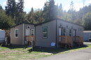 In this Sept. 18, 2026 photo, a pair of newly-installed one-bedroom HOPE homes sits near the front of Saginaw Mobile Home Park.