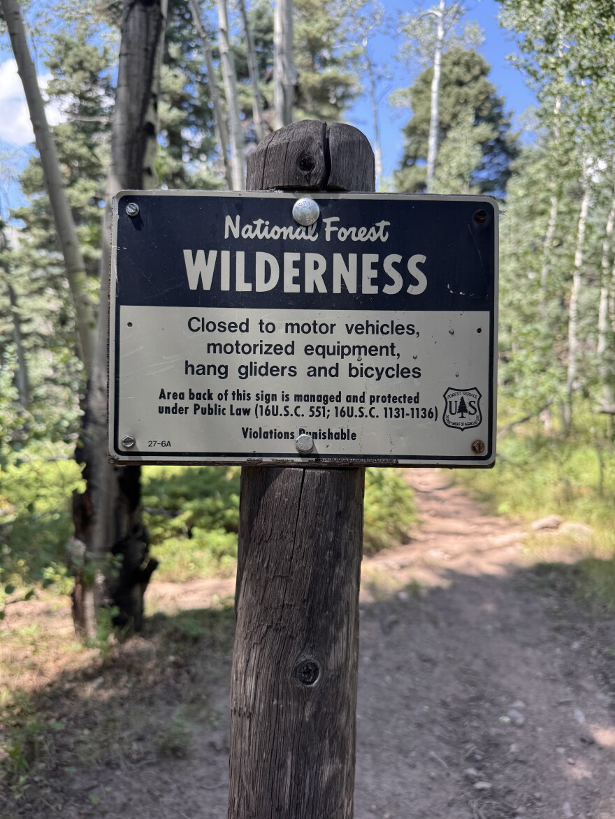 A sign describes activities prohibited by the Wilderness Act