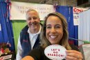 NC GOP finance director Sarah Newby, right, and state chair Michael Whatley display a "Let's go, Brandon" sticker in an image Newby tweeted.