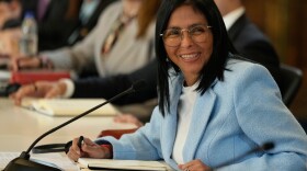 FILE - Venezuela's acting President Delcy Rodriguez smiles during a meeting with a delegation led by U.S. Energy Secretary Chris Wright at Miraflores Palace in Caracas, Venezuela, Feb. 11, 2026. (AP Photo/Ariana Cubillos, File)