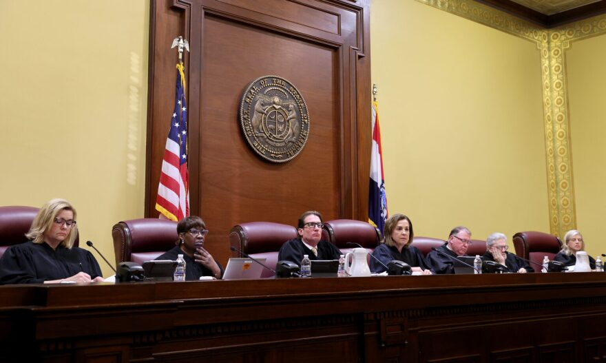 The Missouri Supreme Court takes the bench on Tuesday, Sept. 10, 2024 in Jefferson City to hear a case questioning whether an amendment to overturn the state's abortion ban will remain on the states November ballot. From left are Judges Kelly C. Broniec, Robin Ransom, W. Brent Powell, Chief Justice Mary R. Russell, Zel. M. Fischer, Paul C. Wilson and Ginger K. Gooch.