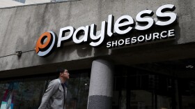 A pedestrian walks by a Payless Shoe Source store on April 5, 2017 in San Francisco. The Kansas-based discount shoe retailer has filed for Chapter 11 bankruptcy and will close nearly 400 of its stores. (Justin Sullivan/Getty Images)