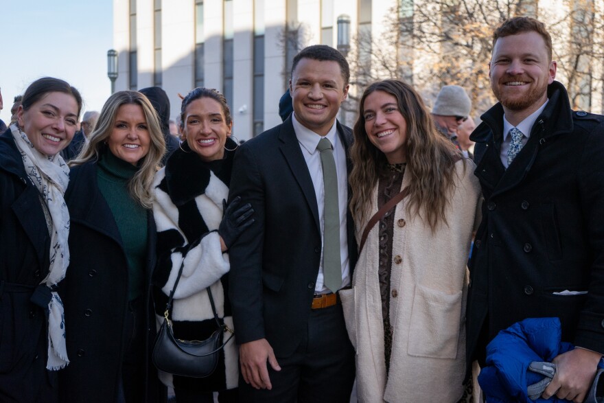 Nikita Ramos (left) and Dominik Tuluono (third from right) went to the funeral of apostle Jeffrey R. Holland with a group.