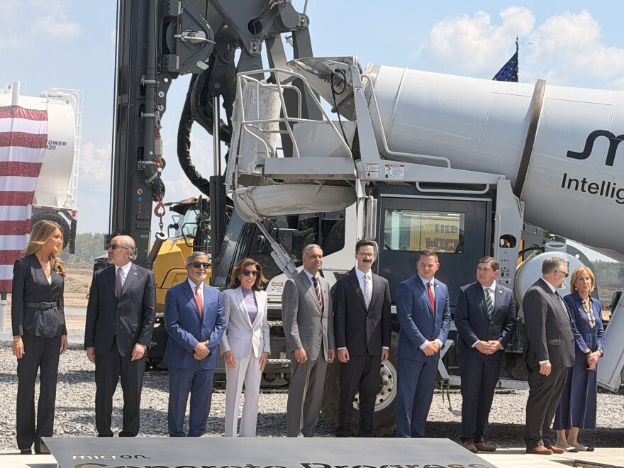 Photos of the ceremony to mark the first pouring of concrete at Micron's massive computer chip fabrication plant in the town of Clay, NY. 
