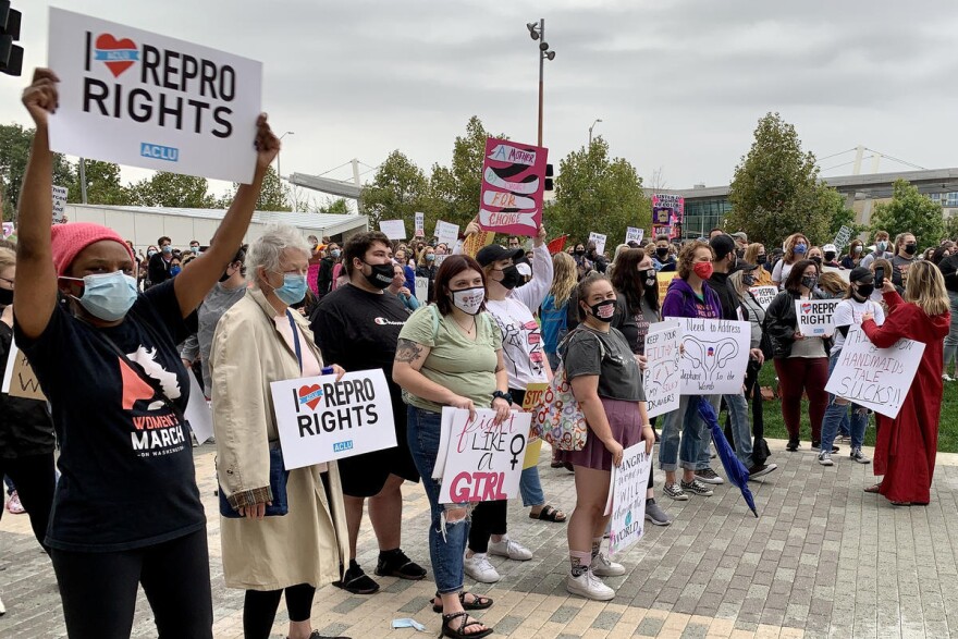 Hundreds rallied in pouring rain in downtown Indianapolis as part of a nationwide call to action for reproductive rights.