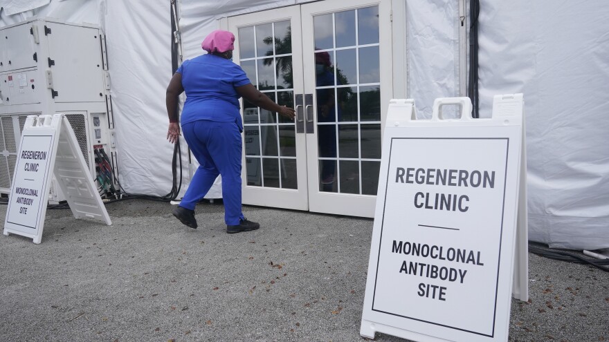 A nurse enters a monoclonal antibody site on Aug. 18, 2021, at C.B. Smith Park in Pembroke Pines.