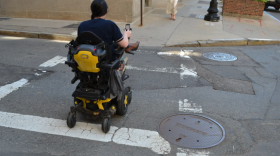 Destiny Maxim outside the statehouse in Boston, Massachusetts, June 2026.