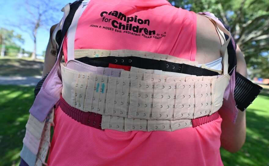 Russ had help from his wife adding extenders to bras so they would fit over each other.