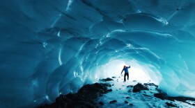 Skating in a small ice cave below Byron Glacier, in the Chugach National Forest of Alaska. (Paxson Woebler/Unsplash)
