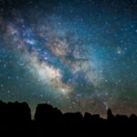 Dark sky photo of Milky Way above Chesler Park at Canyonlands National Park