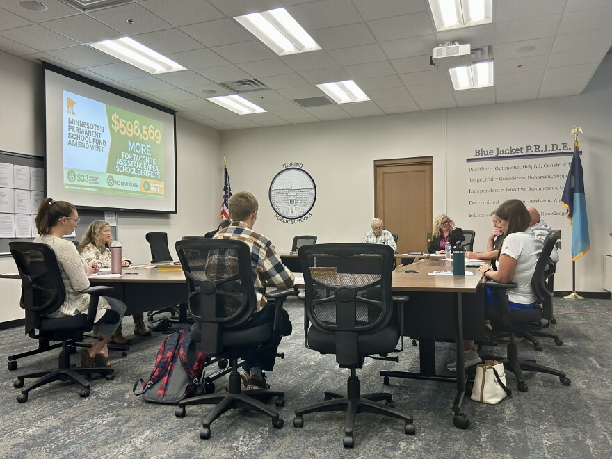 Hibbing School Board members converse during a meeting at Hibbing High School on Sept. 9, 2026.