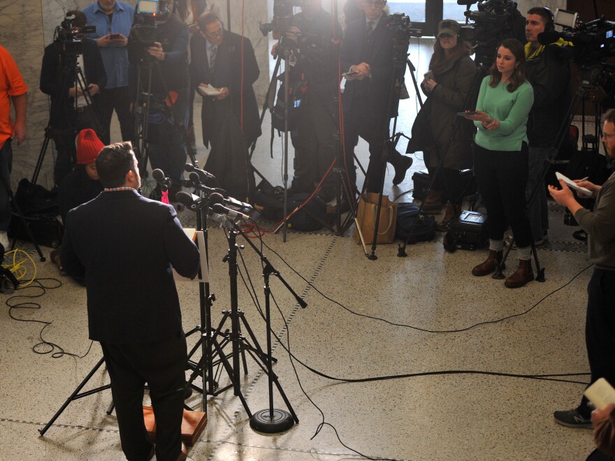 Troy Price, chairman of the Iowa Democratic Party, addresses the media about the aftermath of the Iowa caucuses on Friday in Des Moines.