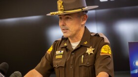 A Utah Highway Patrol sergeant speaks during a press conference about the safety of moving over for safety vehicles.