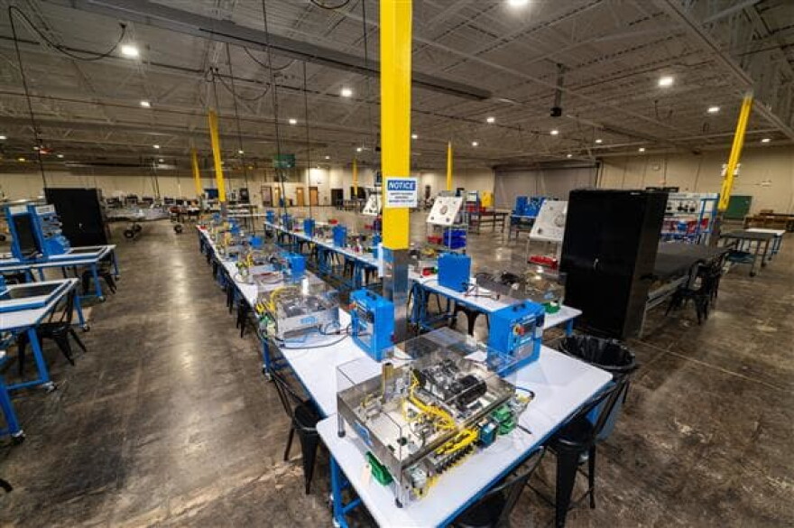 This photo shows workspaces on the shop floor at the FutureReady Center for advanced manufacturing and aviation. The shop floor would get air-conditioning under the district's bond proposal.