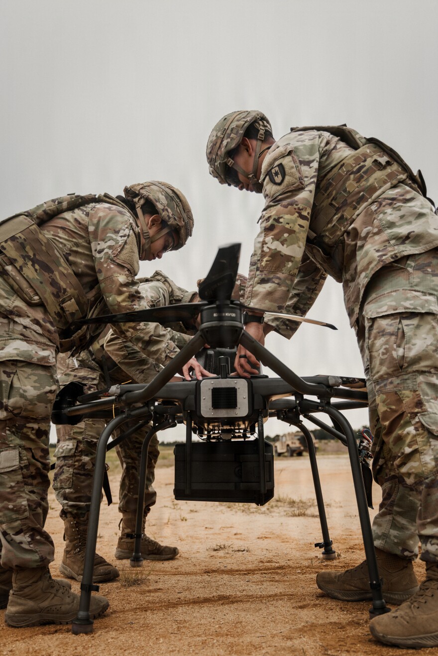 Soldiers from Fort Bragg's 44th Medical Brigade set up a drone during a field training exercise April 28, 2026. The soldiers, who had no prior drone experience, practiced using the devices for such tasks as providing medical supplies during missions. The exercise included Ukrainian combat surgeons who brought lessons of how drones are affecting battlefield medical care in the Ukraine War.