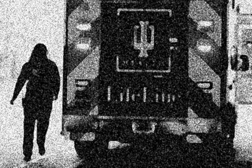 An Indiana University Health paramedic walks beside a LifeLine ambulance. Cody Halstead, a current paramedic with IU Health, has sued the company, alleging discrimination in a federal lawsuit.