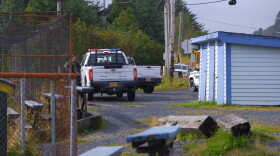 State troopers and Kodiak police park in front of the softball field on Mill Bay Road on Sept. 25.