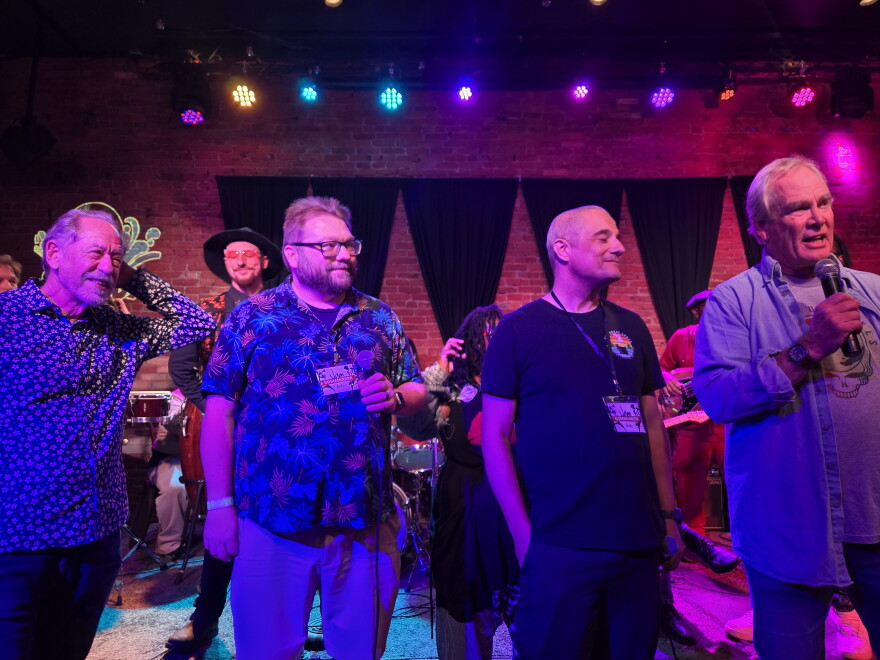 Terry Terry, John K. Addis, Jeff Boog and David Waymire speaking into microphones at UrbanBeat.
