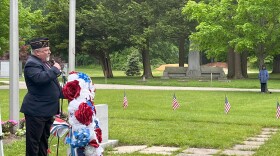 Wayne Gower, commander of the American Legion Post 8 in Dover, speaks during the town's Memorial Day ceremony Monday.