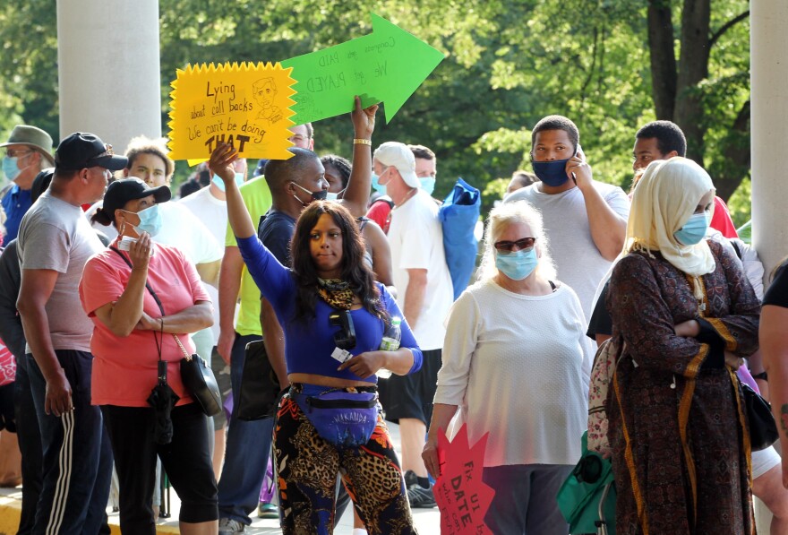 Hundreds of unemployed Kentucky residents wait in long lines outside the Kentucky Career Center for help with their unemployment claims on June 19, 2020 in Frankfort, Kentucky. (John Sommers II/Getty Images)