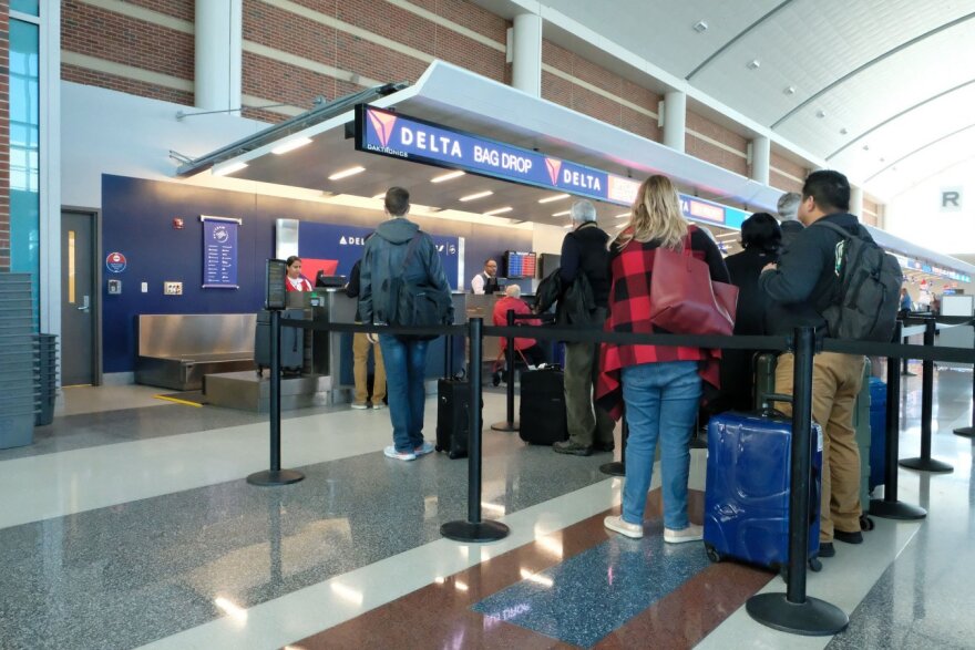 Transportation officials say with more people than ever passing through security this holiday season, they want to prevent confusion and missed flights. They're urging travelers to get their REAL ID within the next couple of months. (Whittney Evans/VPM News)