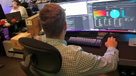 Specialist Isaac Marshall, an analyst with the North Carolina National Guard Cyber Security Response Force, builds a simulated computer network for a training event to help state and local government IT workers learn to recognize and respond to cyber attacks.