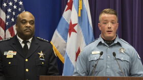Chicago Police Officer Mike Donnelly, accompanied by Police Superintendent Eddie Johnson, left, speaks at a news conference Thursday, Jan. 5, 2017, in Chicago. Johnson said four black people have been charged with hate crimes in connection with a video broadcast live on Facebook that showed an assault on a mentally disabled white man. Donnelly was one of the first officers on the scene. (Teresa Crawford/AP)