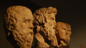 Four Greek stone busts. 