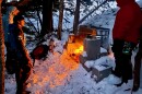 A good old-fashioned fire melts snow which then runs down the face of a rock wall at Kona Hills Campground in Marquette. The effort is meant to provide a consistent surface for climbers who come to the U.P. looking for ice, which has been less predictable in recent winters. (Photo courtesy of Kona Hills)