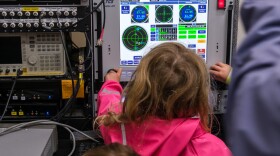Kids got to play with some of the non-sensitive computers and equipment, August 14, 2023. (Brian Venua/KMXT)