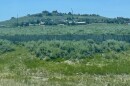 the highland flats land is seen from I-80 beneath Highland Estates in 2023