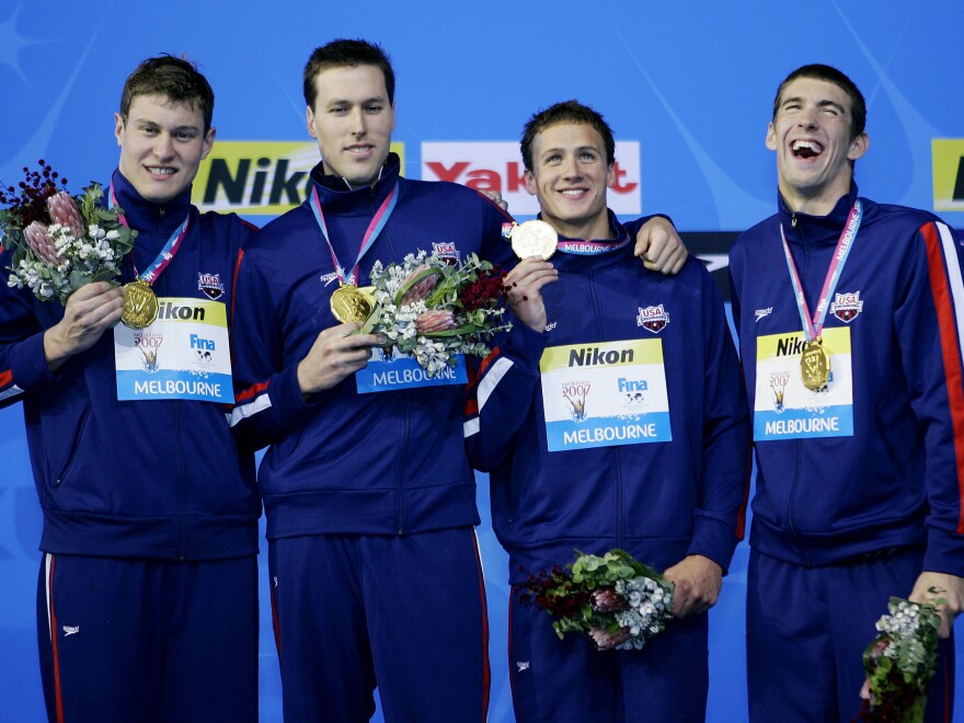 The USA Men's 4x200m Freestyle relay team members, from left, Peter Vanderkaay, Klete Keller, Ryan Lochte and Michael Phelps celebrate after winning the gold medal at the World Swimming Championships in Melbourne, Australia in 2007.