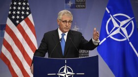 Chuck Hagel gives a press conference during a defence ministers meeting at the NATO headquarters in Brussels on February 5, 2015. (John Thys/AFP/Getty Images)